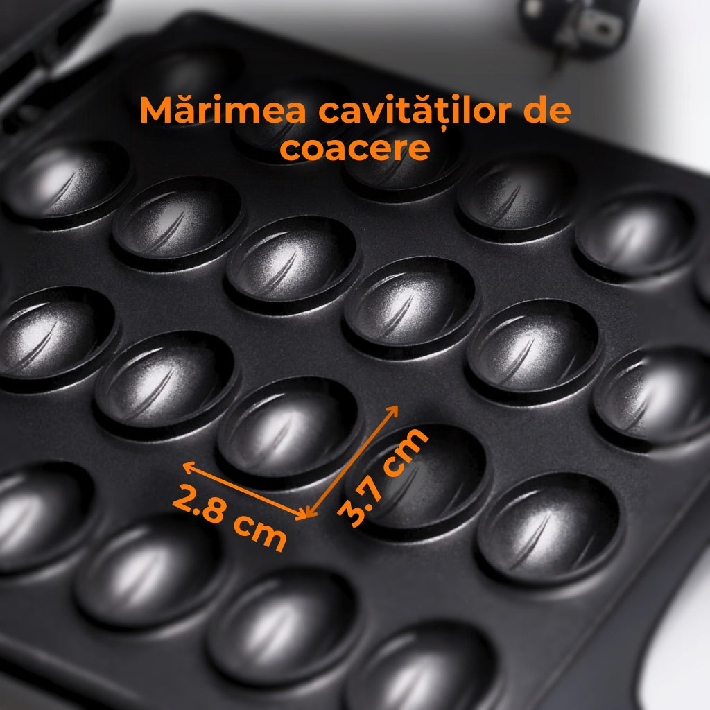 Grill pentru coacerea jumatatilor de nuci Koken negru cu cavitati de marimea: 3.7 cm lungime si 2.8 cm latime. Forma cavitatilor ovala.